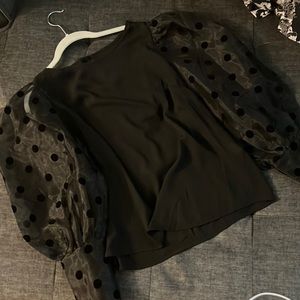 Black Blouse with sheer polka dot sleeves. Size Large - never work no tags